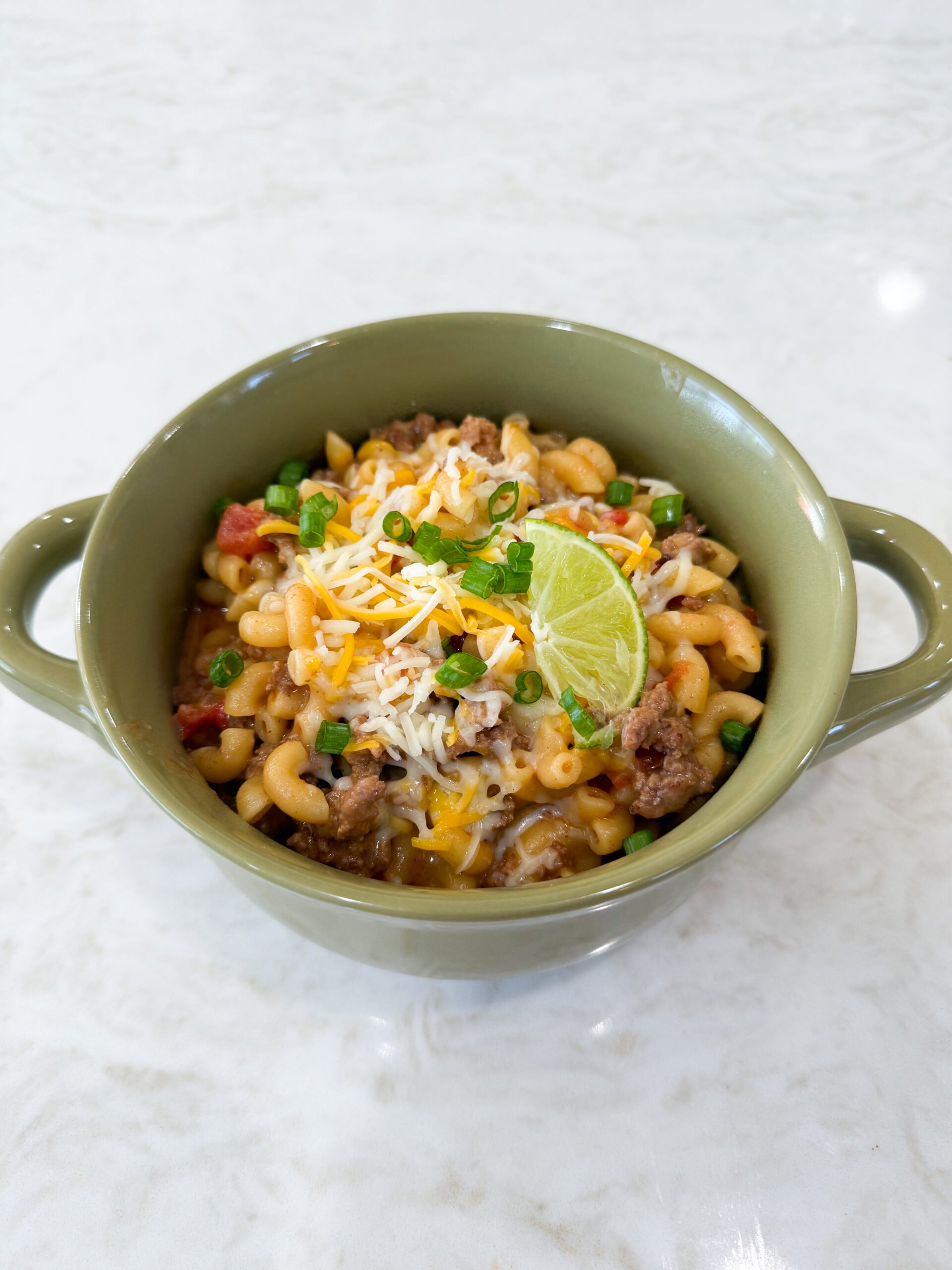 Easy Taco Pasta One Pot Skillet Dinner in a bowl ready to eat.