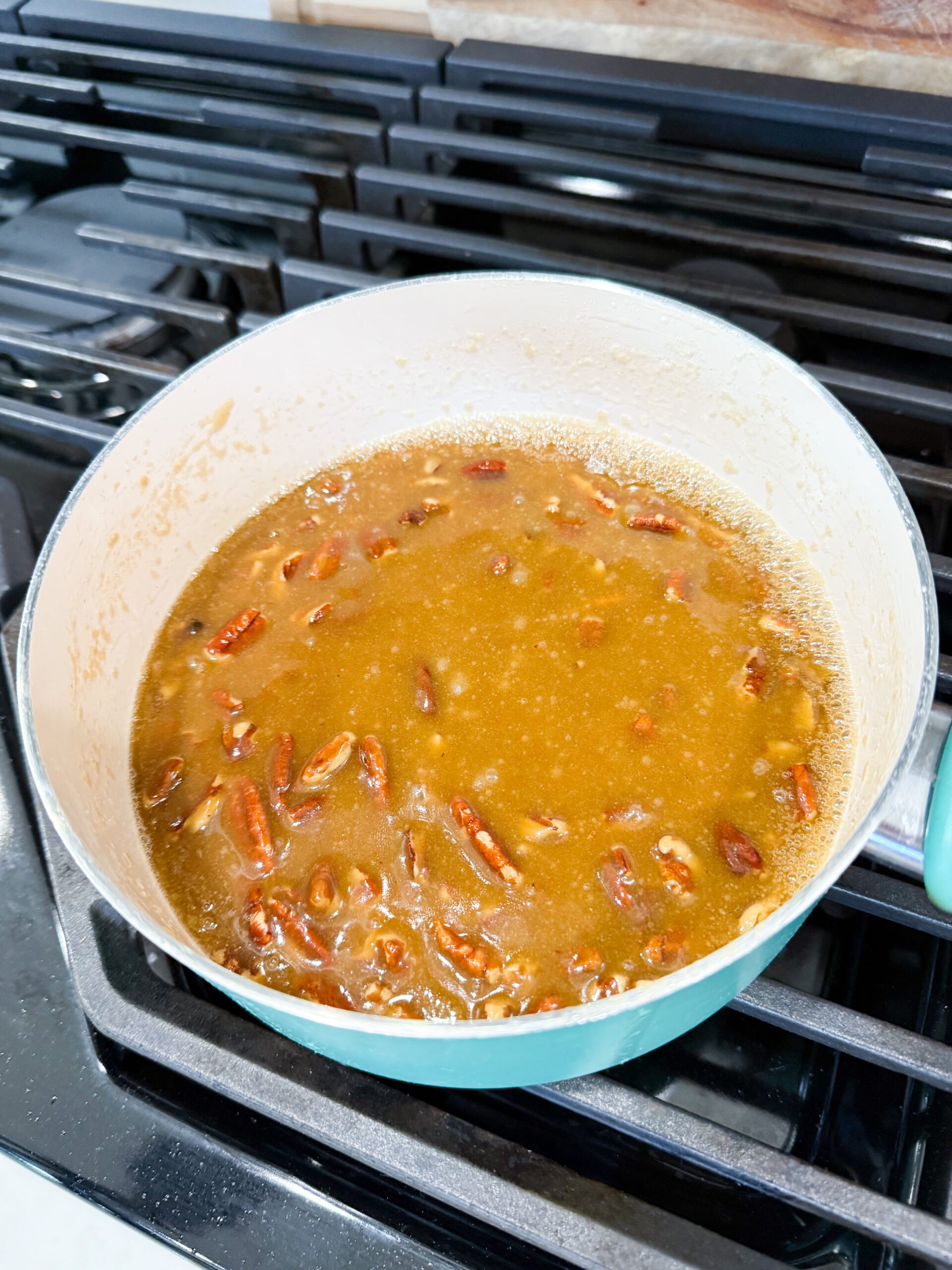 Brown sugar and pecans in saucepan