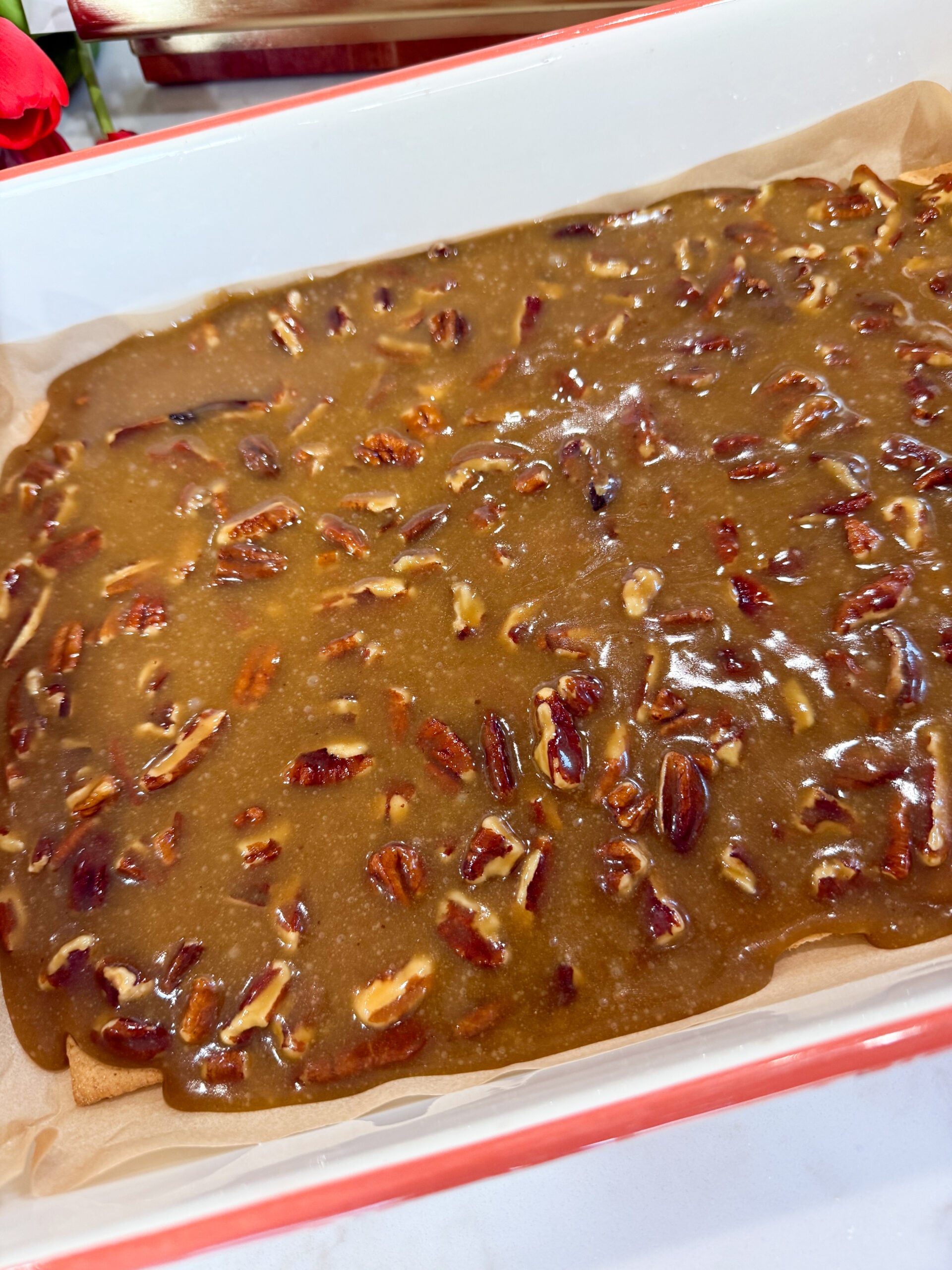 Toffee mixture poured over graham crackers