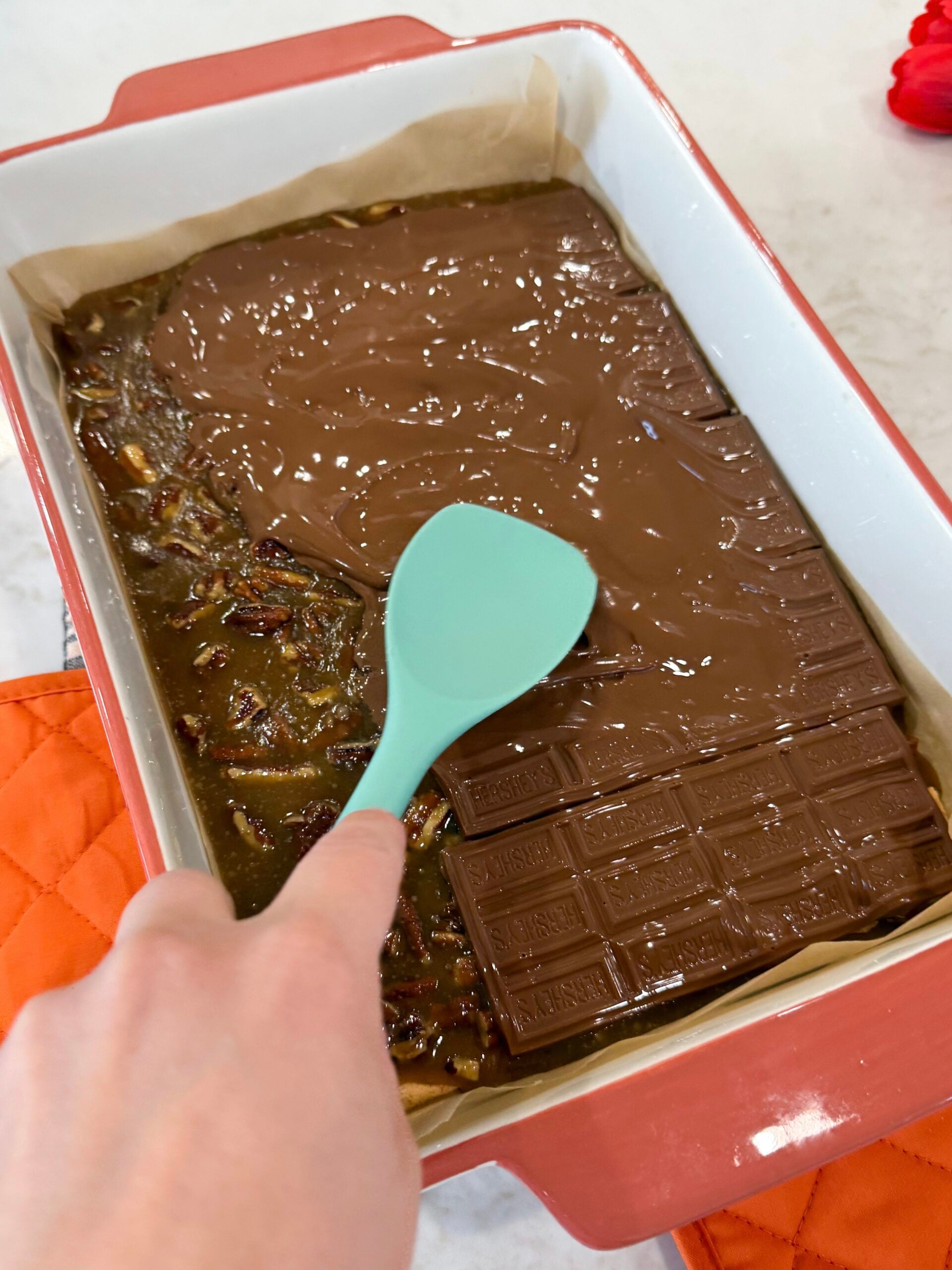 Melted chocolate spread evenly over toffee