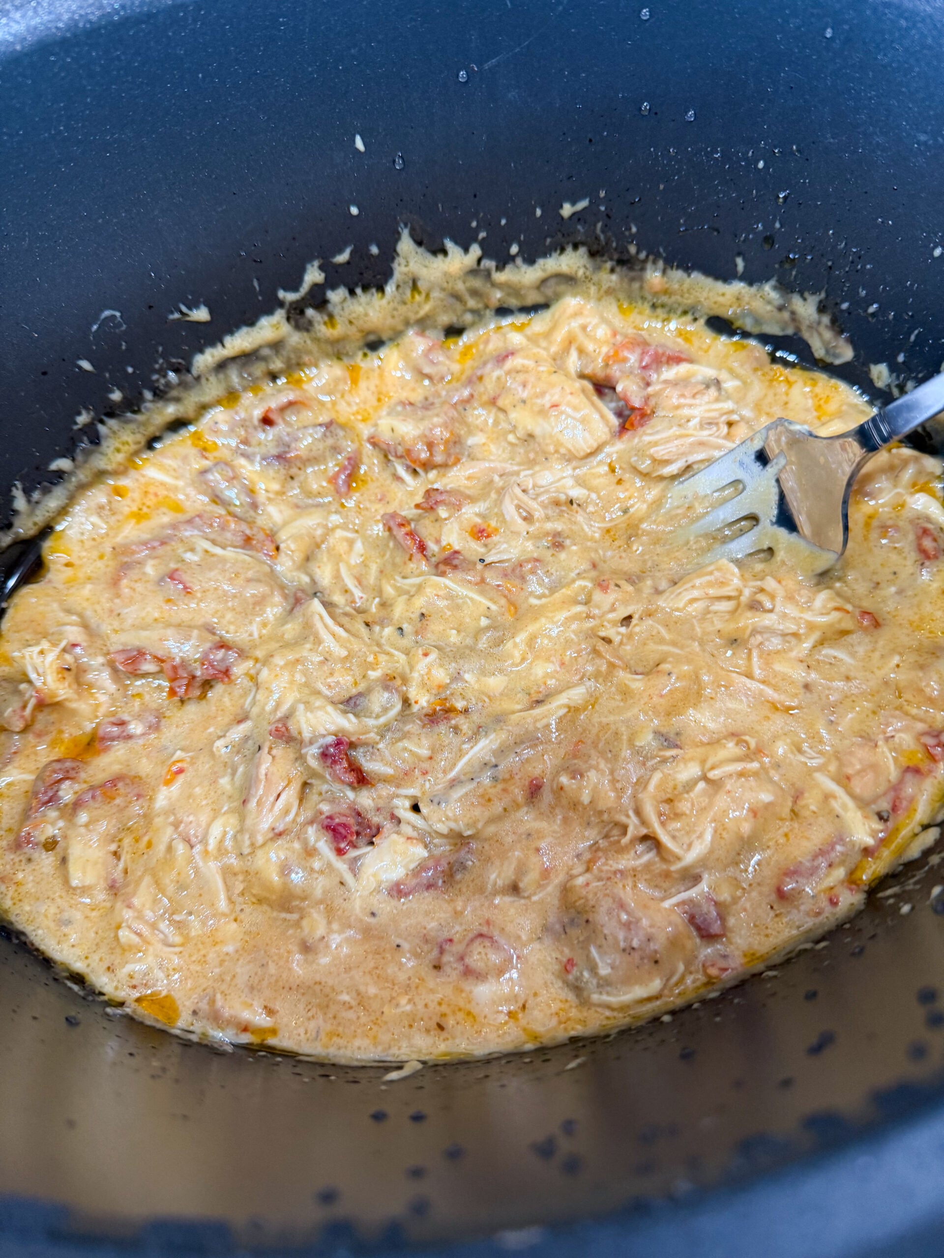 shredded chicken returned to slow cooker