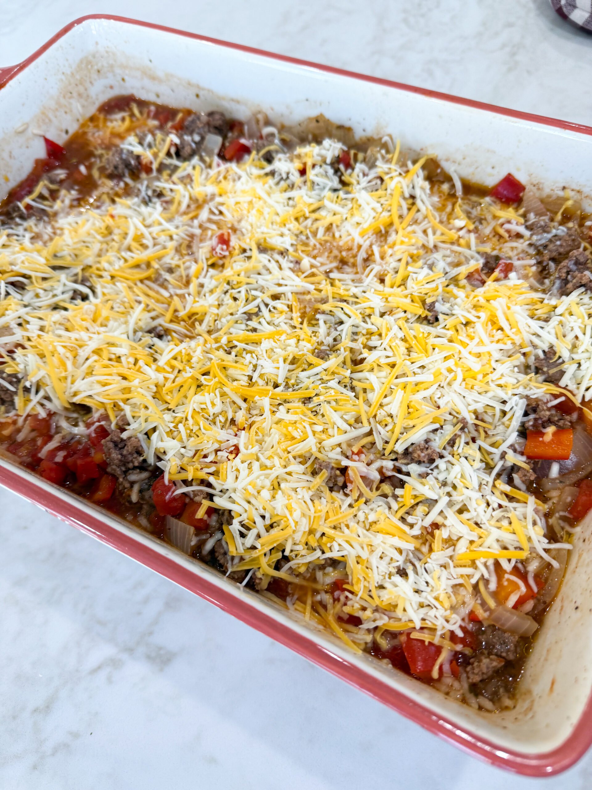 Cheese on top of baked stuffed pepper casserole