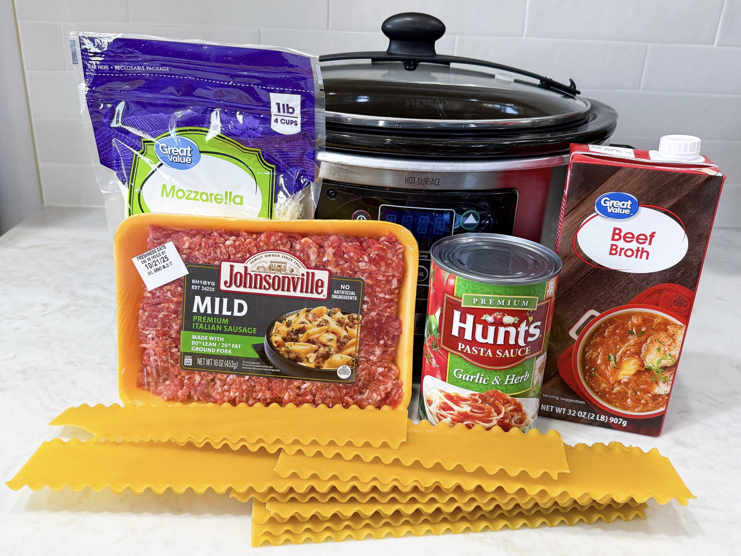 Ingredients for slow cooker lasagna soup on counter