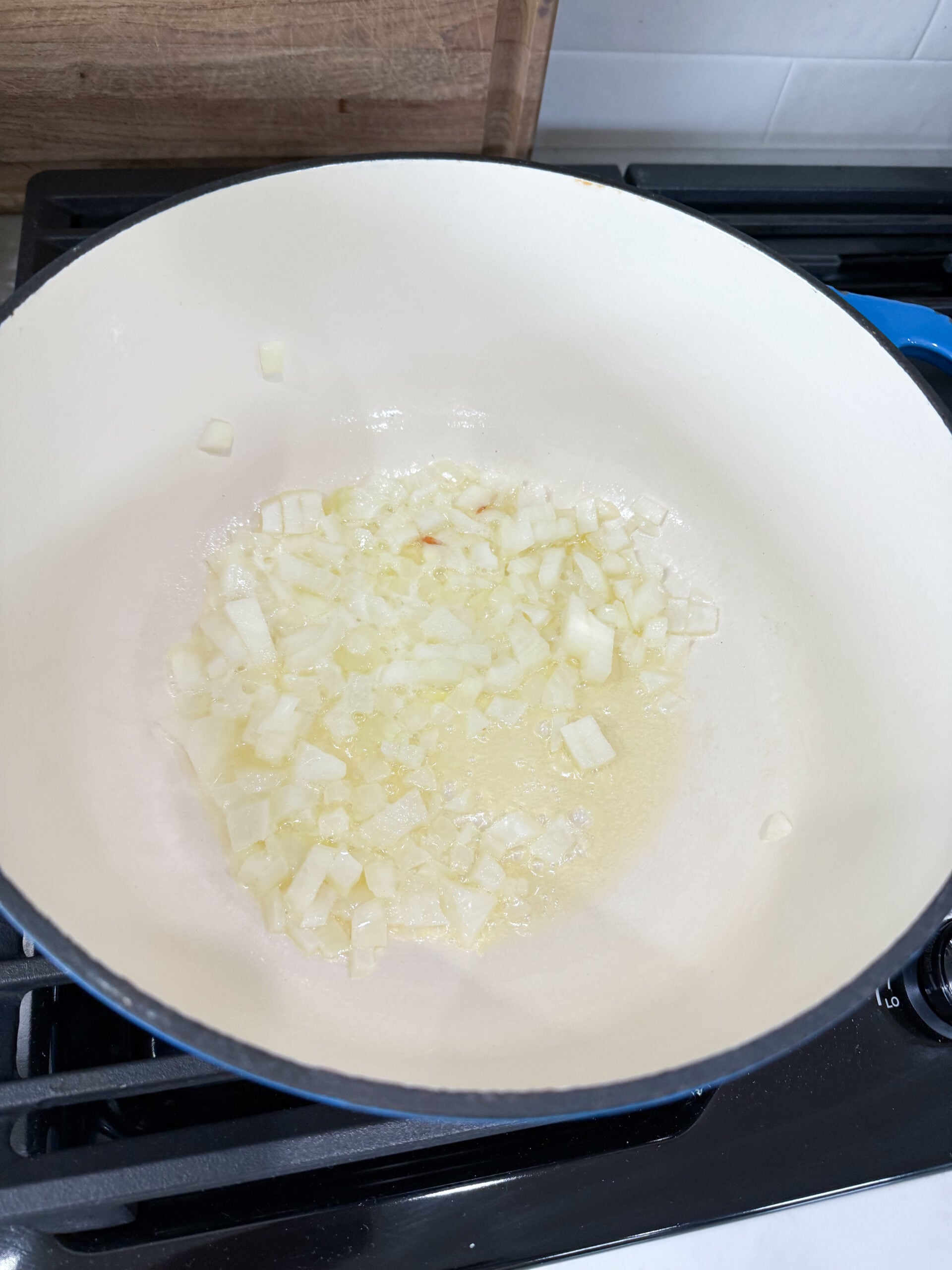 sautéing onions in a pot