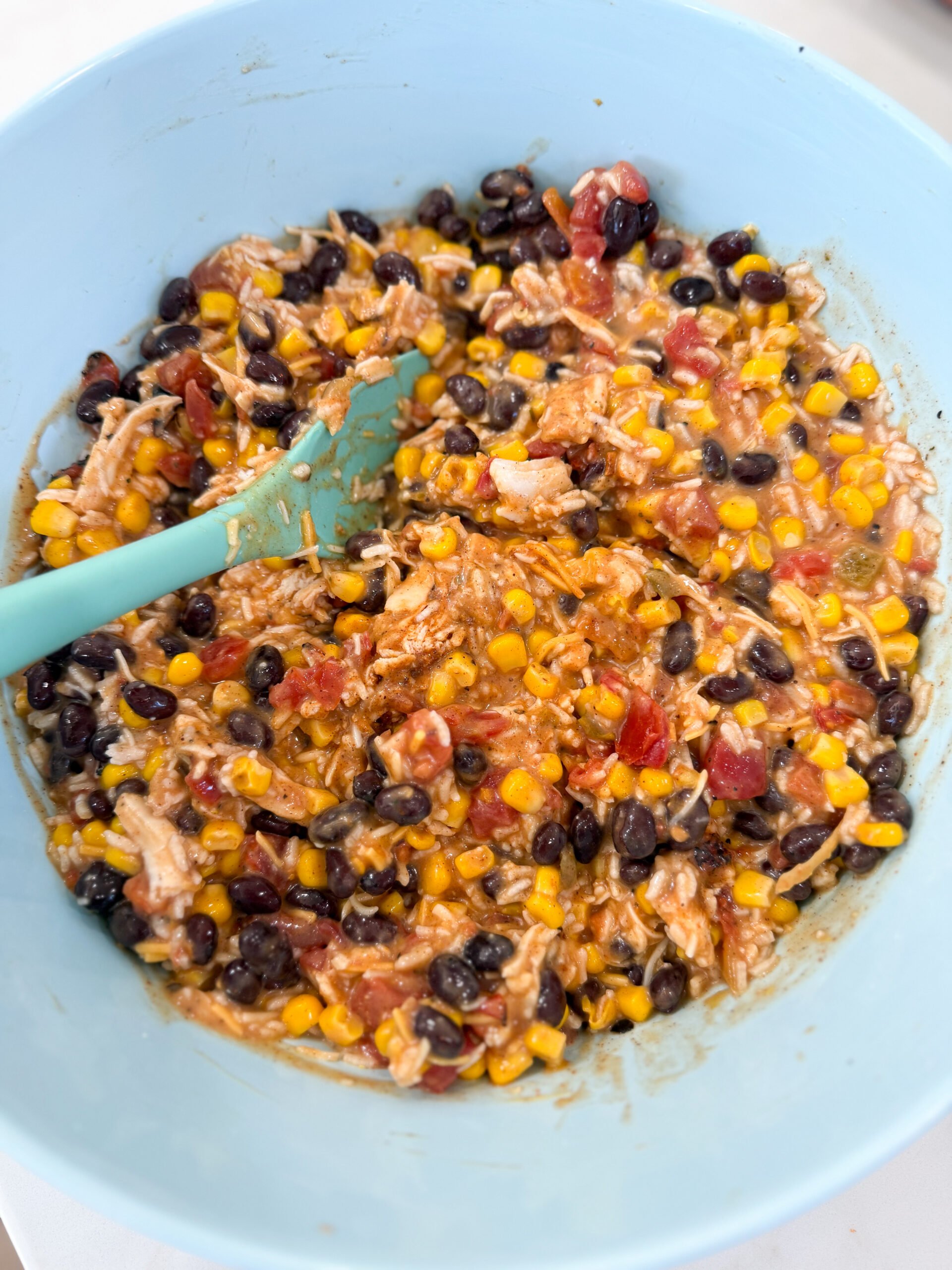 Mixing casserole ingredients in bowl