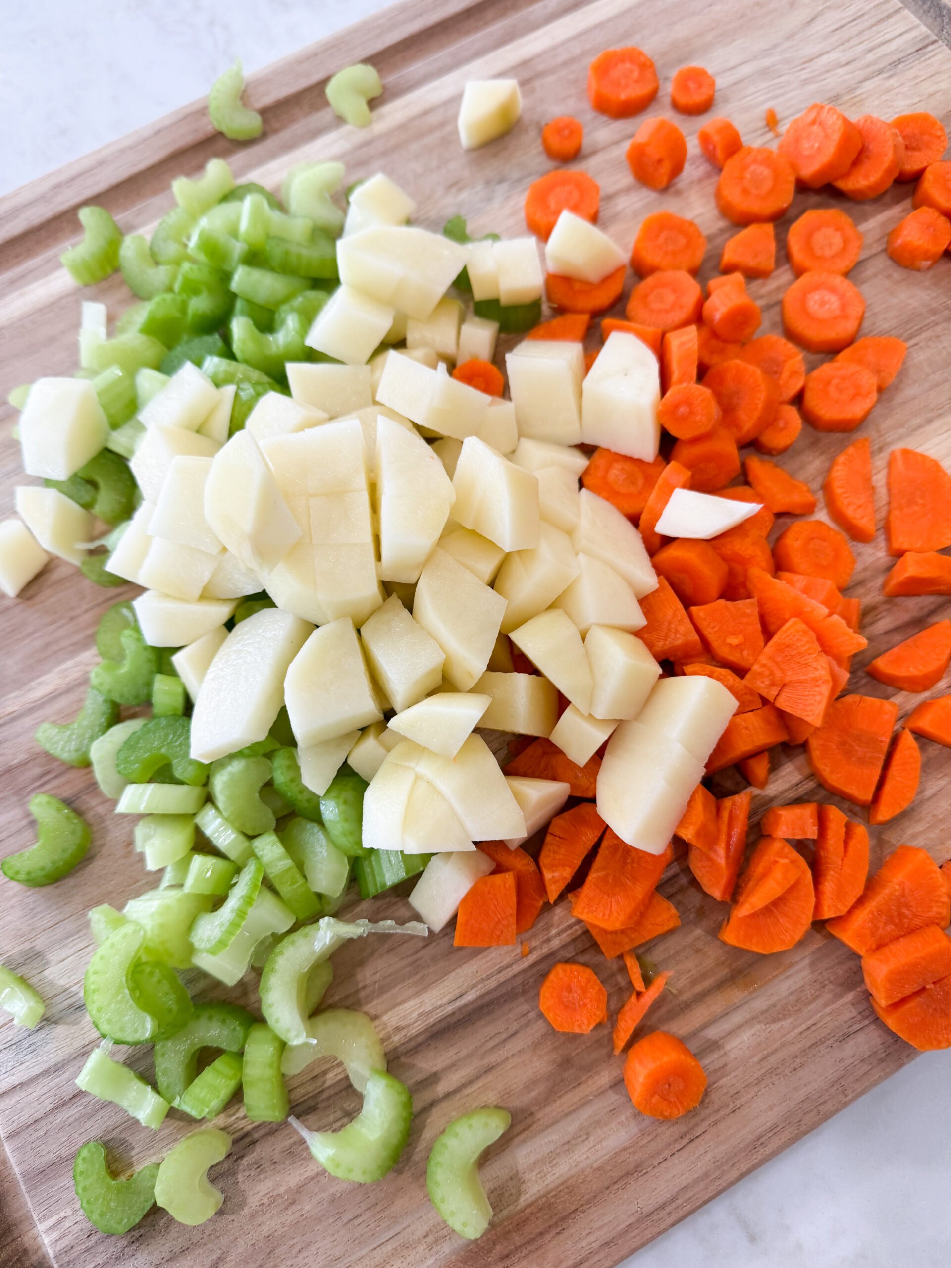 Chopped up potatoes, celery, and carrots