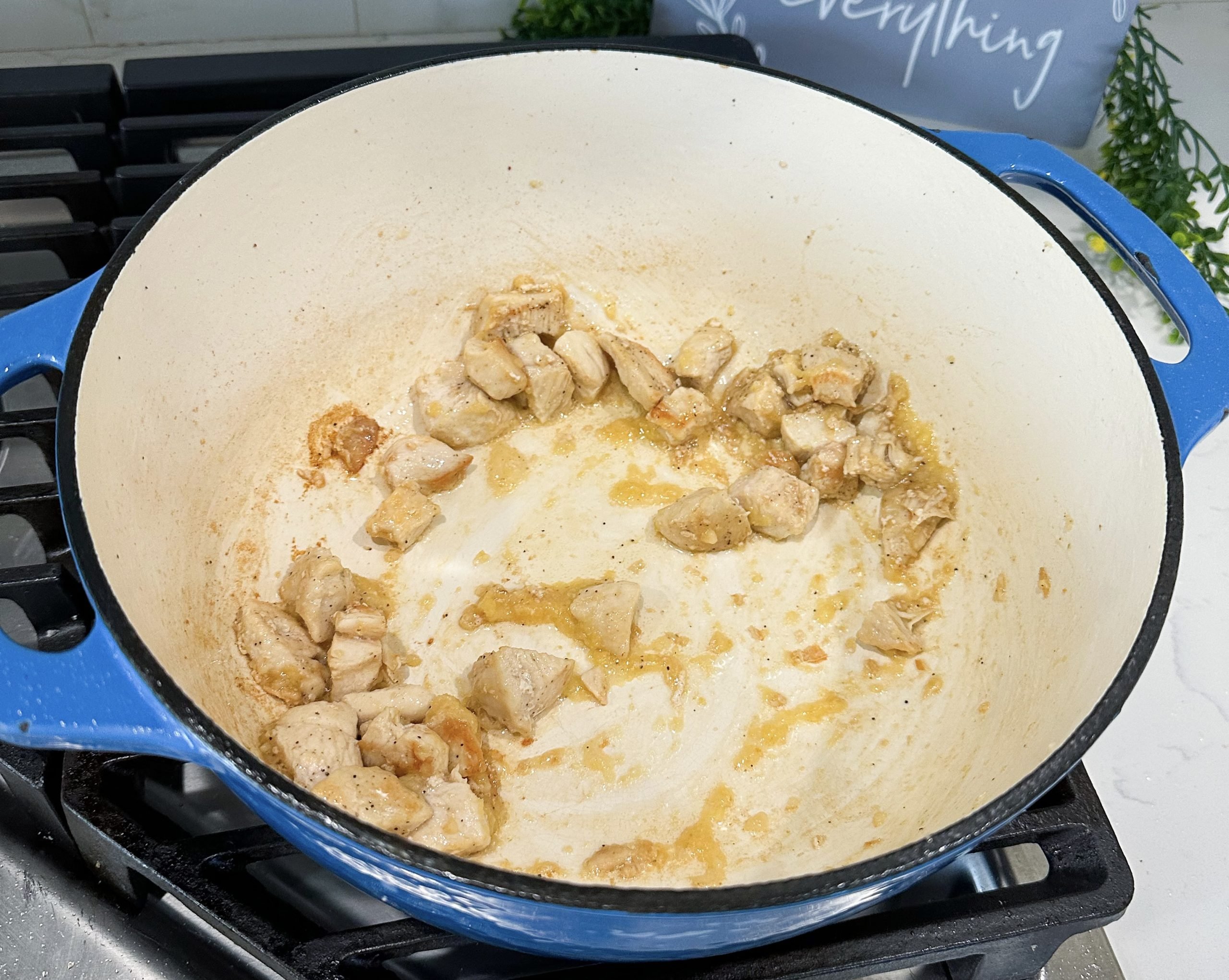 chicken cooking in a pot