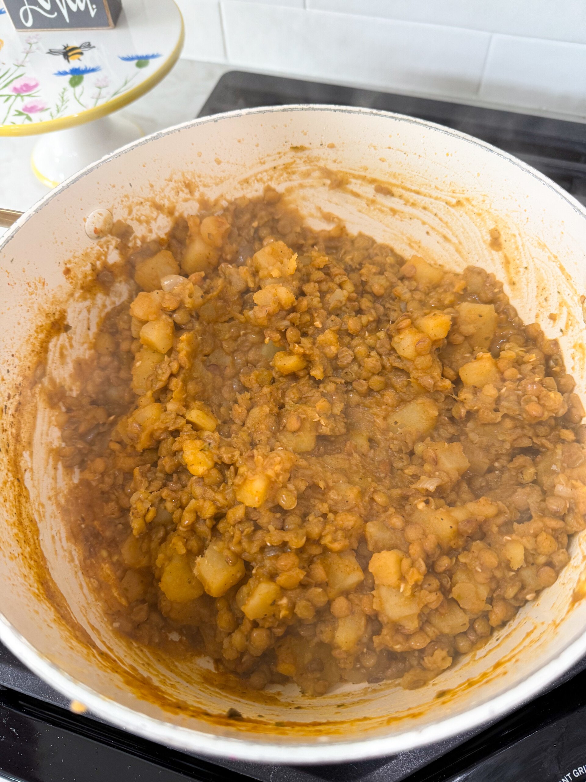 Lentil and potato burrito filling in a pot.