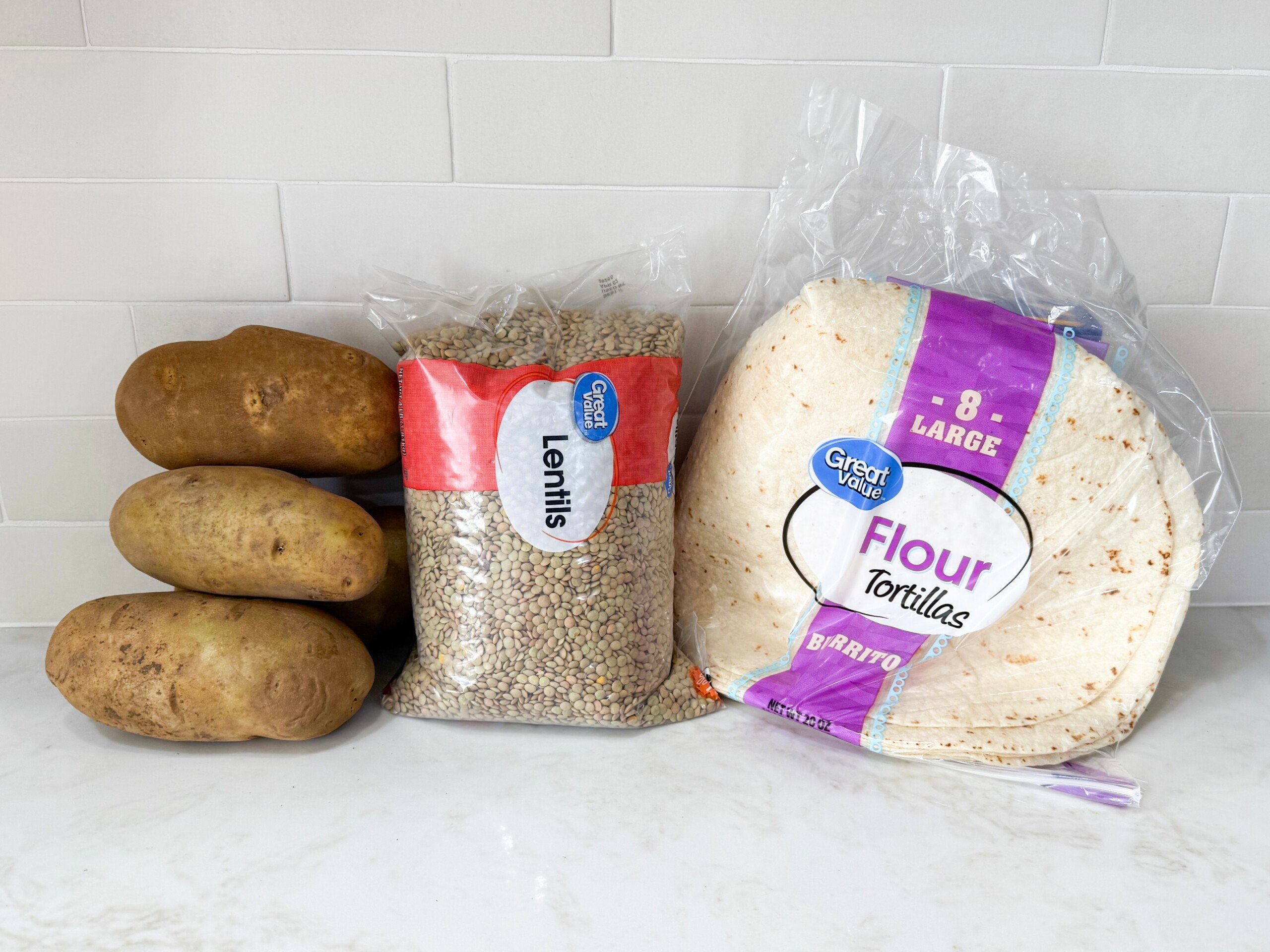 ingredients for lentil wraps on a countertop before preparing.