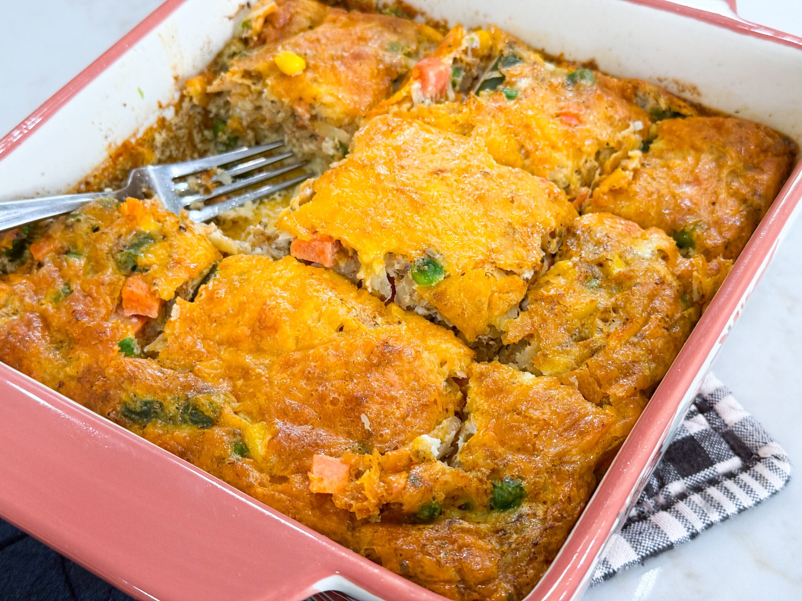 Egg frittata in a casserole dish ready to be served.