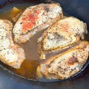 cooked seasoned chicken in a slow cooker