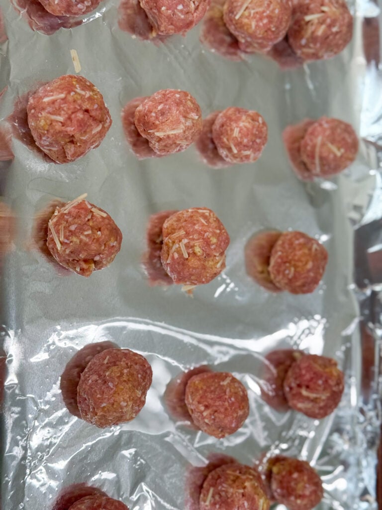 close up cooked turkey meatballs on baking sheet.jpg