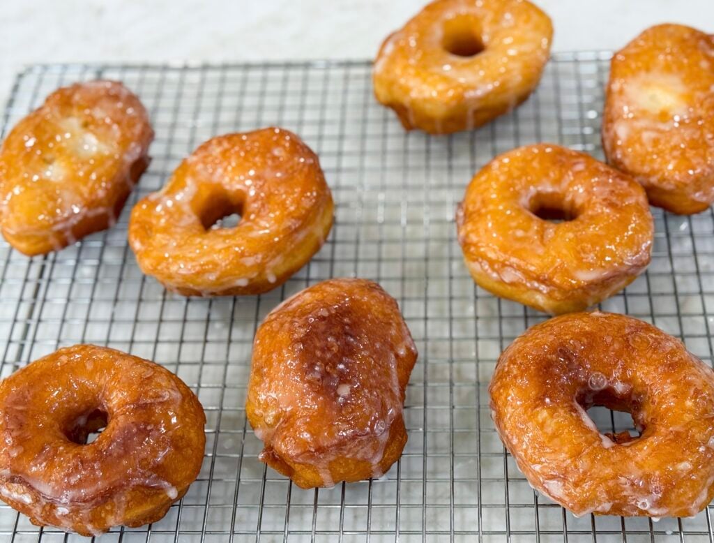 Homemade glazed donuts made from biscuit dough.