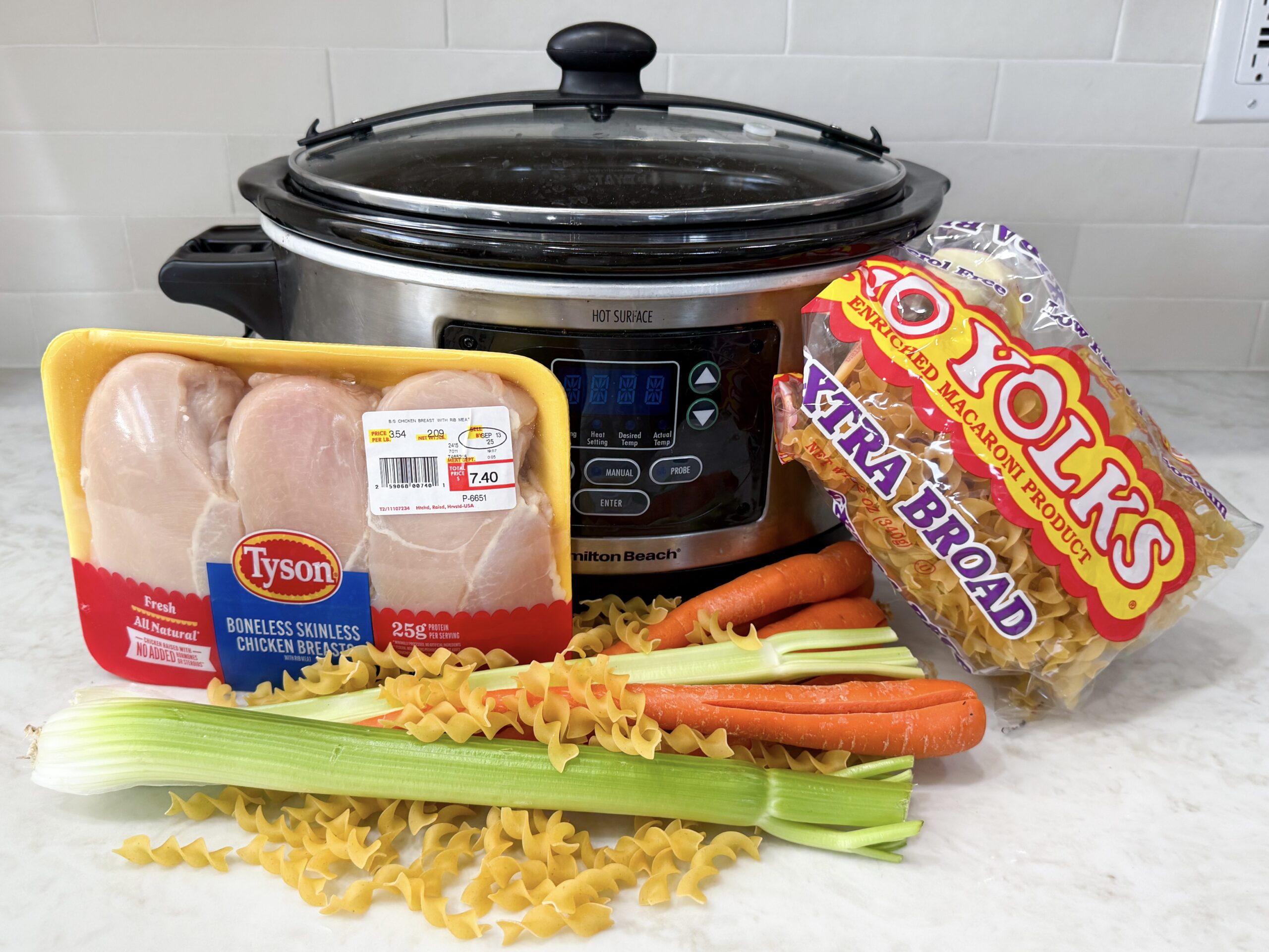 Ingredients for Chicken Noodle Soup on countertop