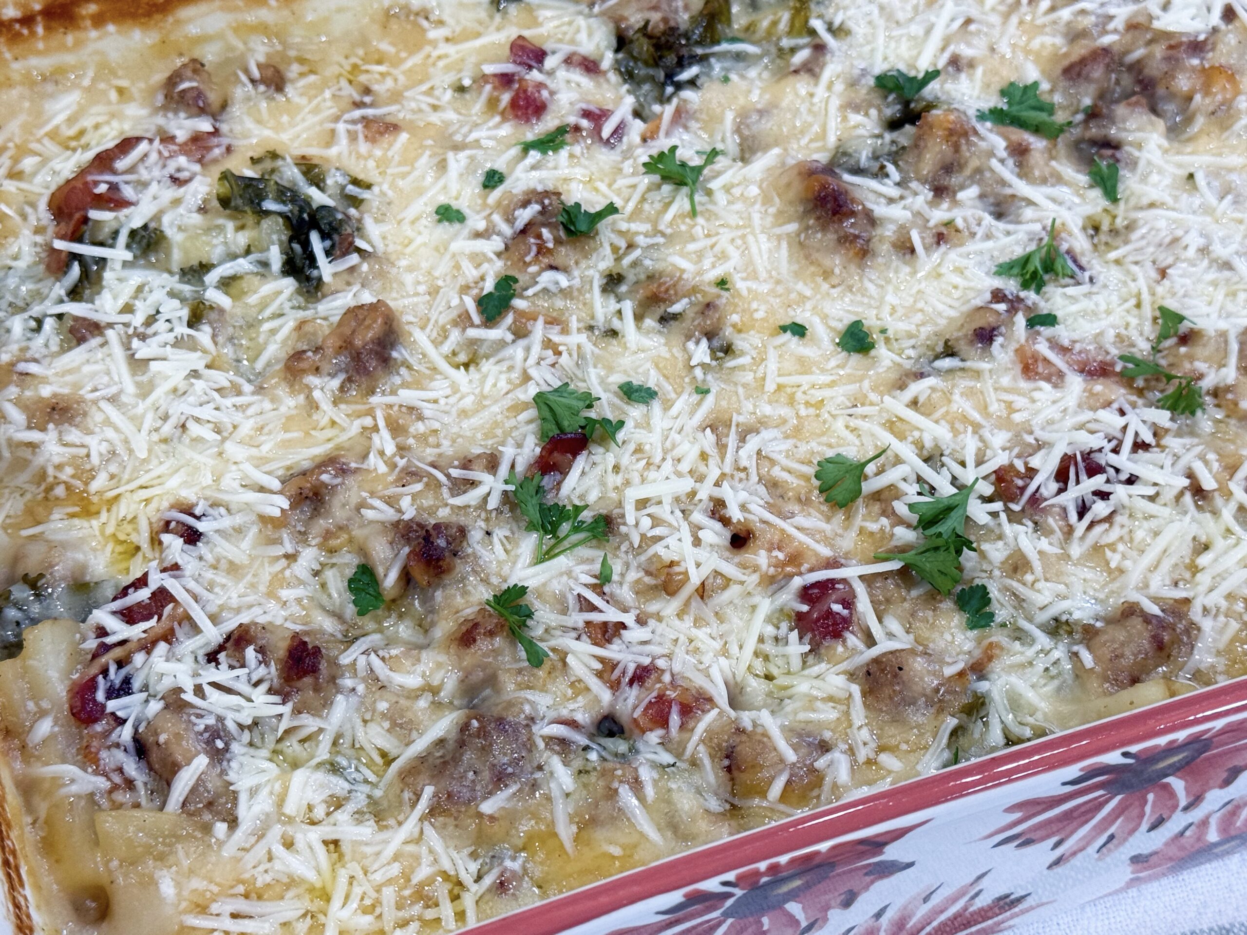 Zuppa Toscana Casserole baked in a 9x13 dish with golden Parmesan topping.