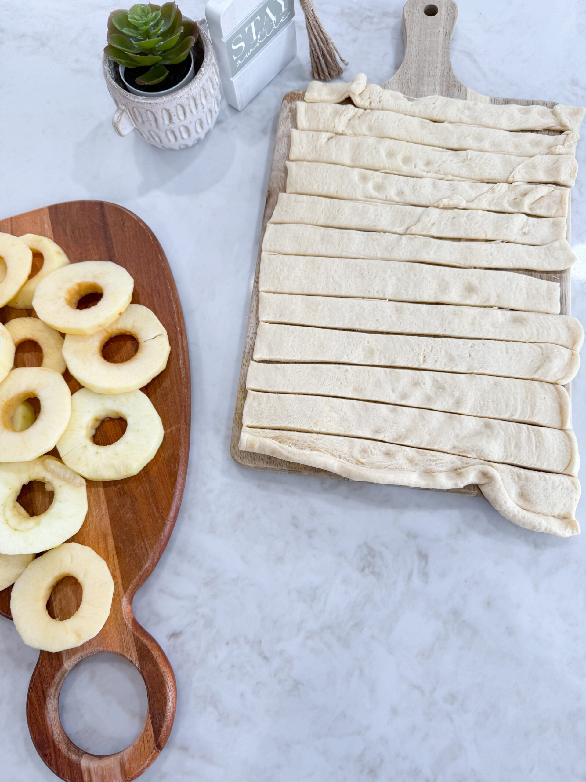 Unrolled crescent dough, cut into thin strips on the counter