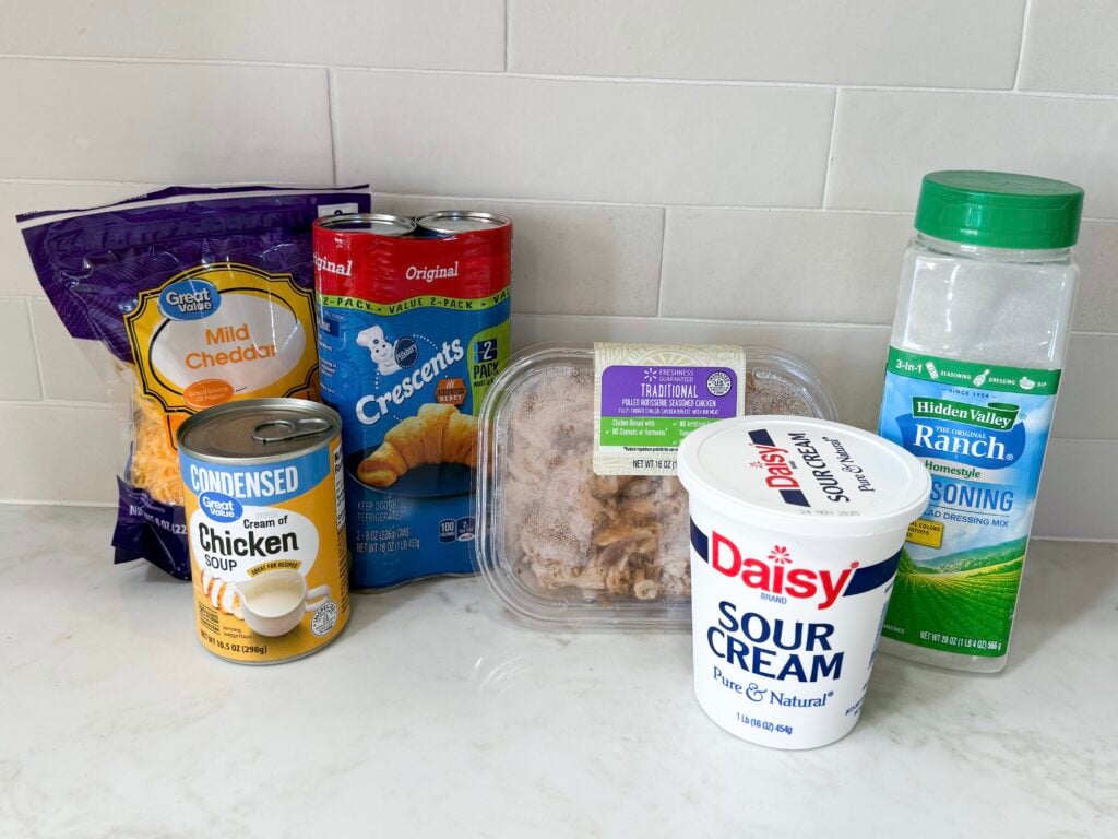 Ingredients for cheesy chicken crescent roll casserole on a counter