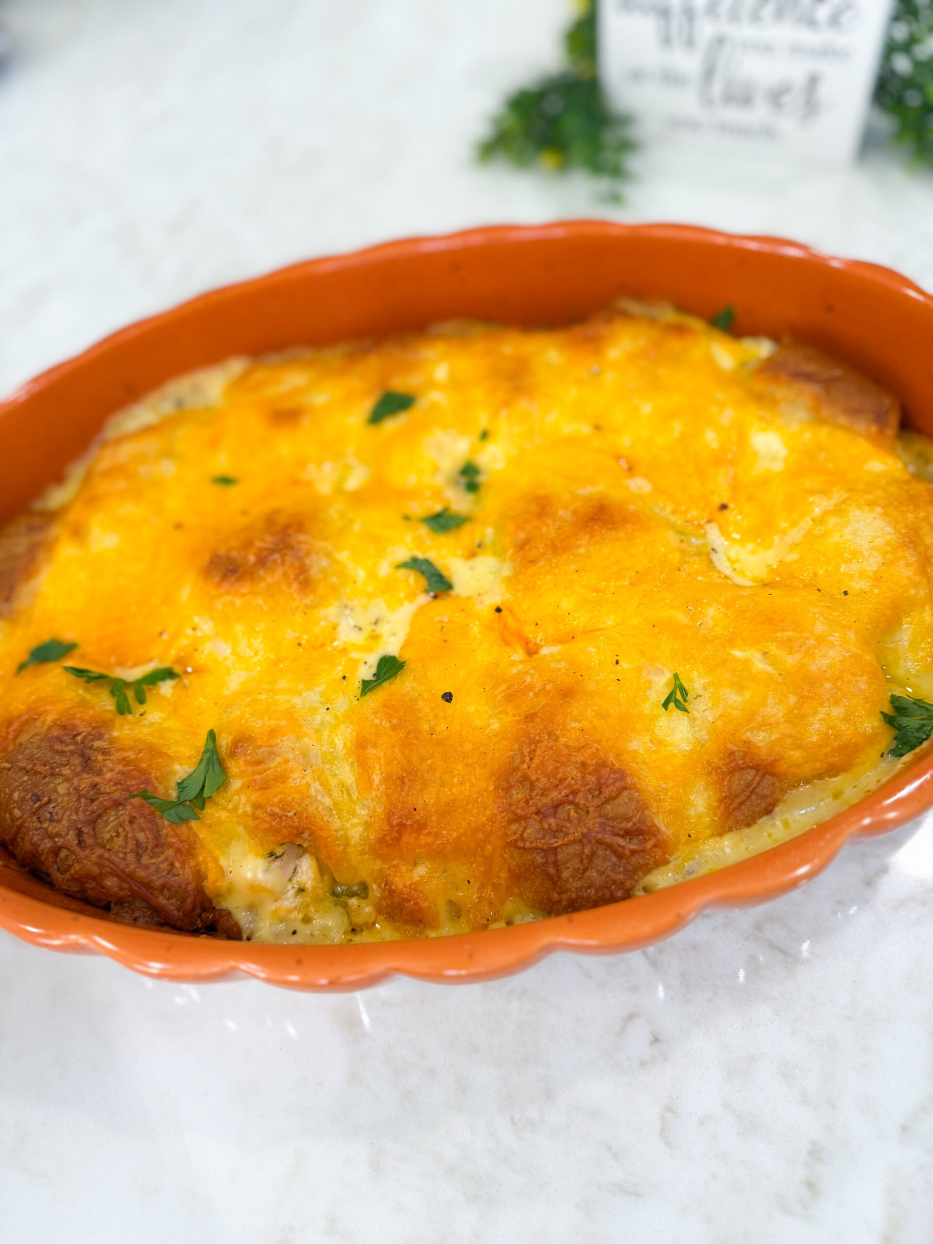 Cheesy chicken crescent roll casserole baked golden in dish