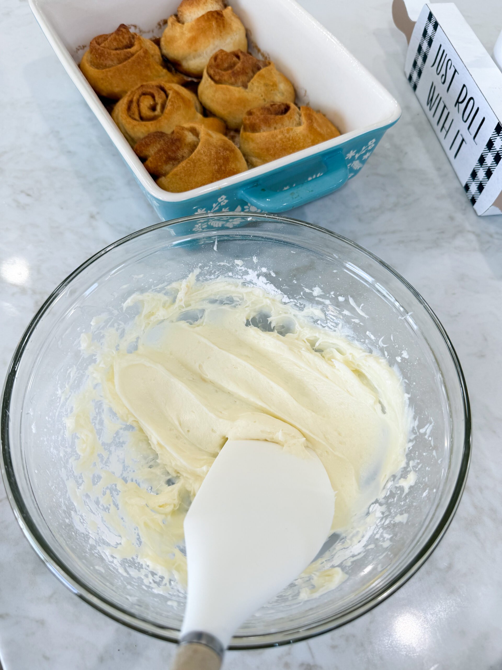 Cream cheese frosting in a mixing bowl