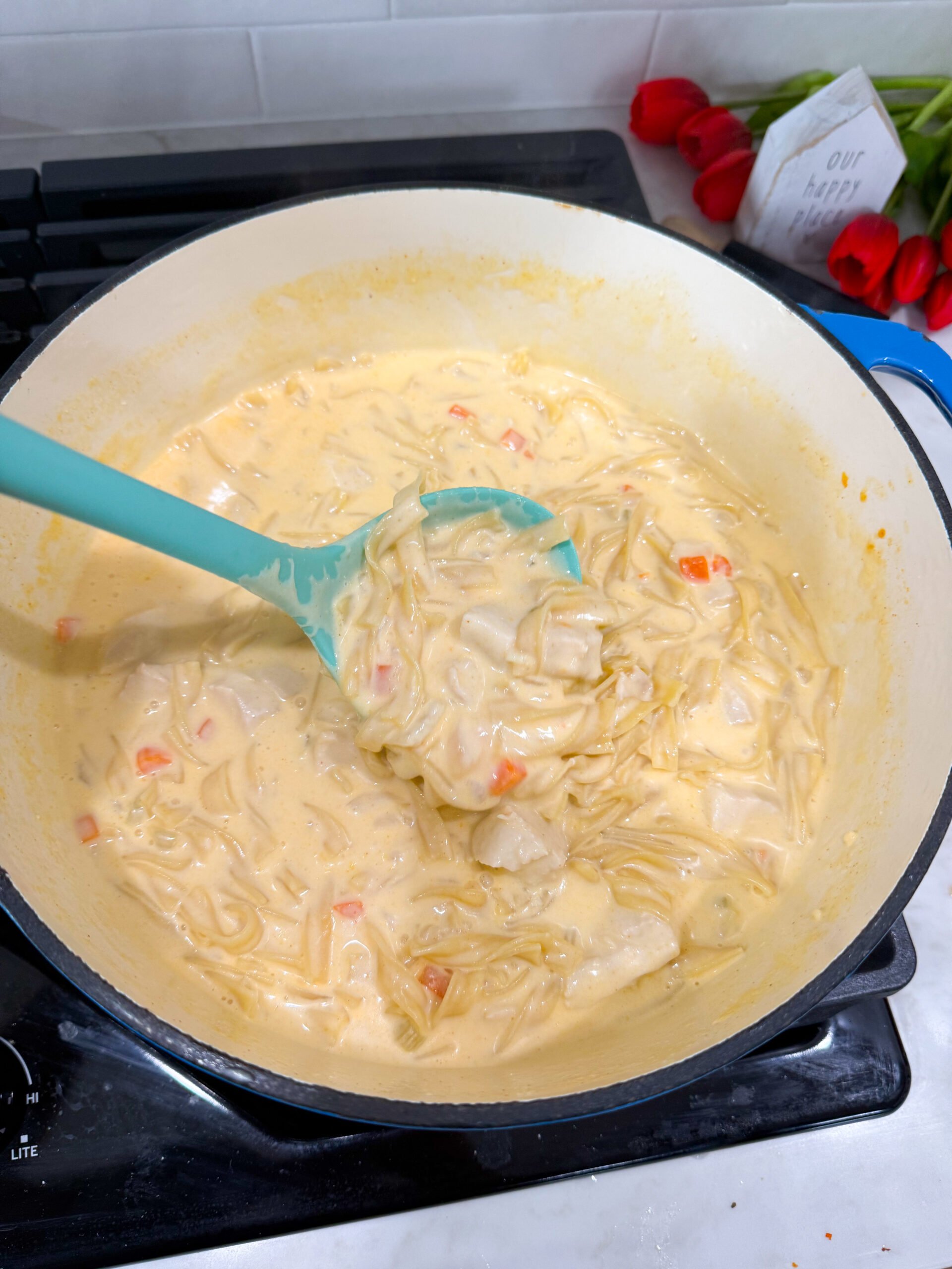 soup simmering with chicken