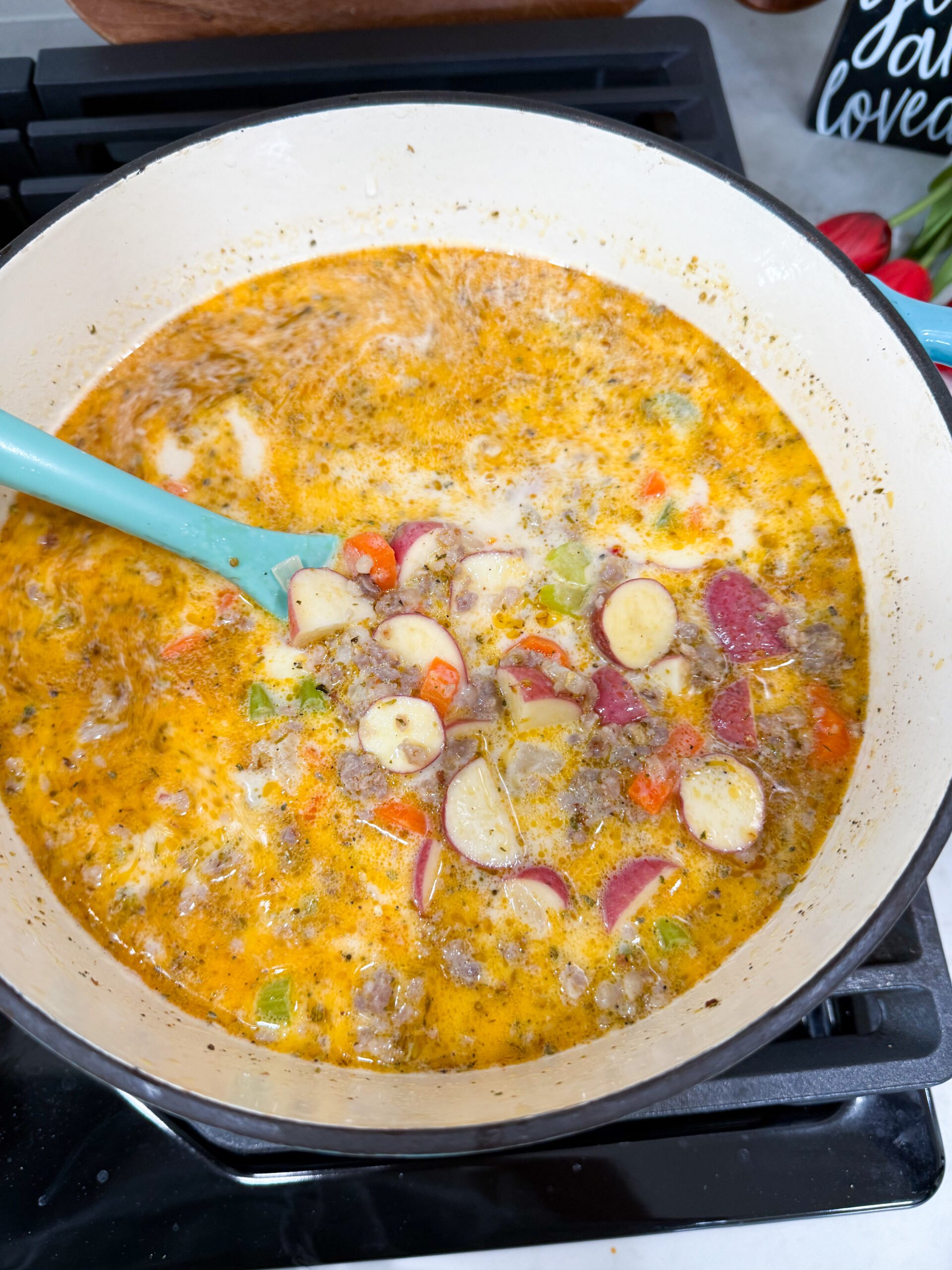 soup simmering with potatoes