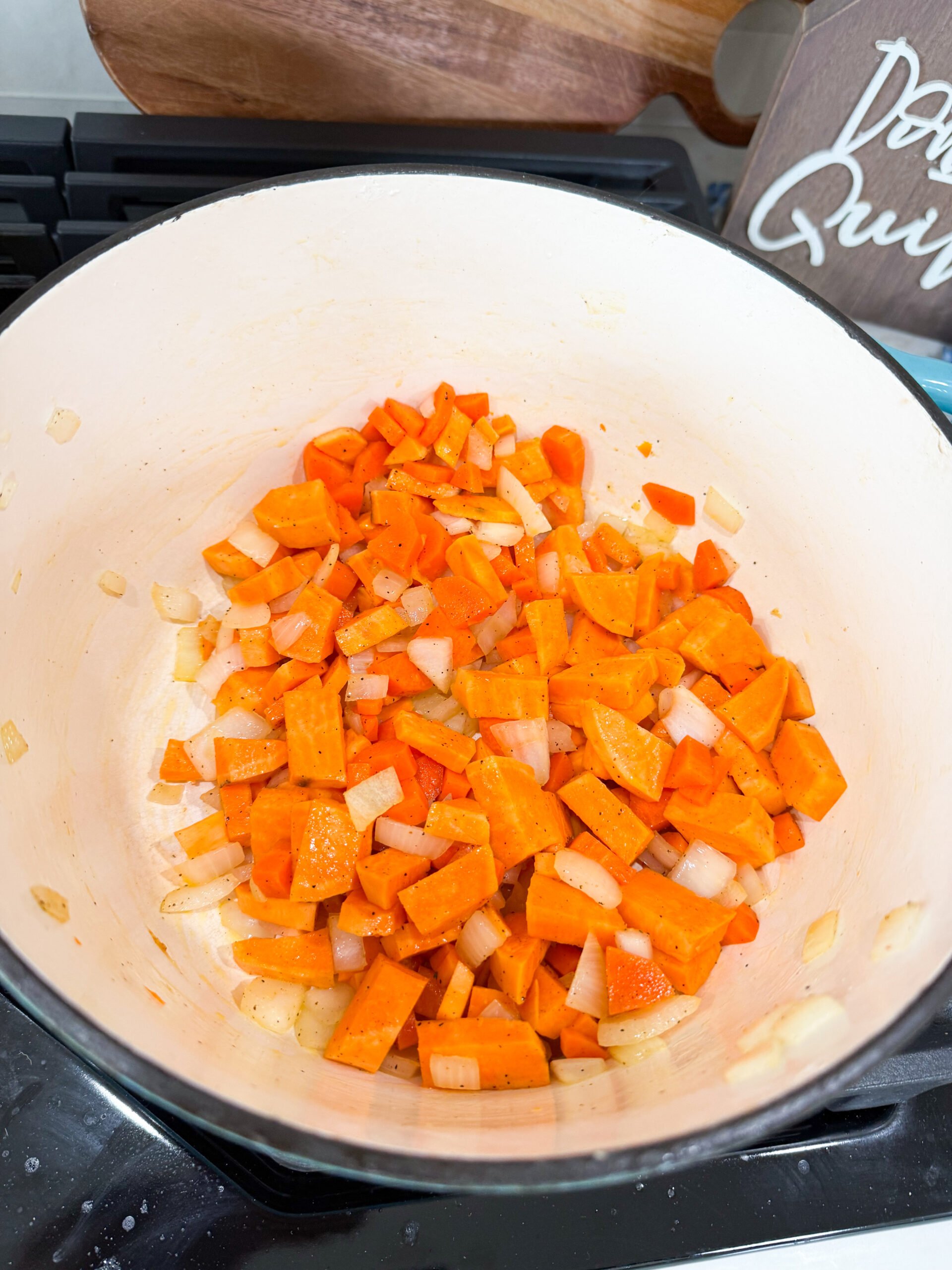 sautéing vegetables in a pot