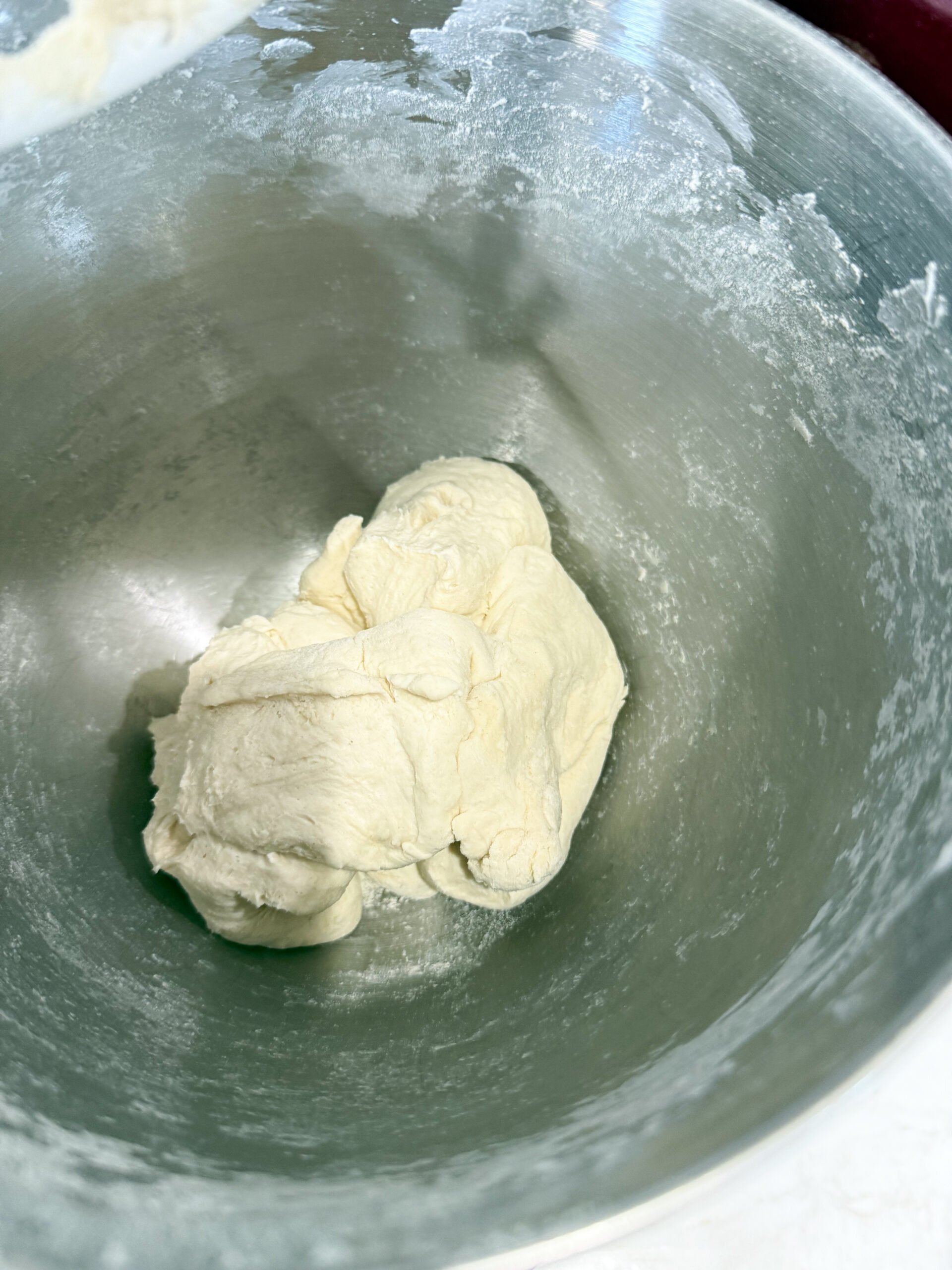 naan dough mixed in a bowl