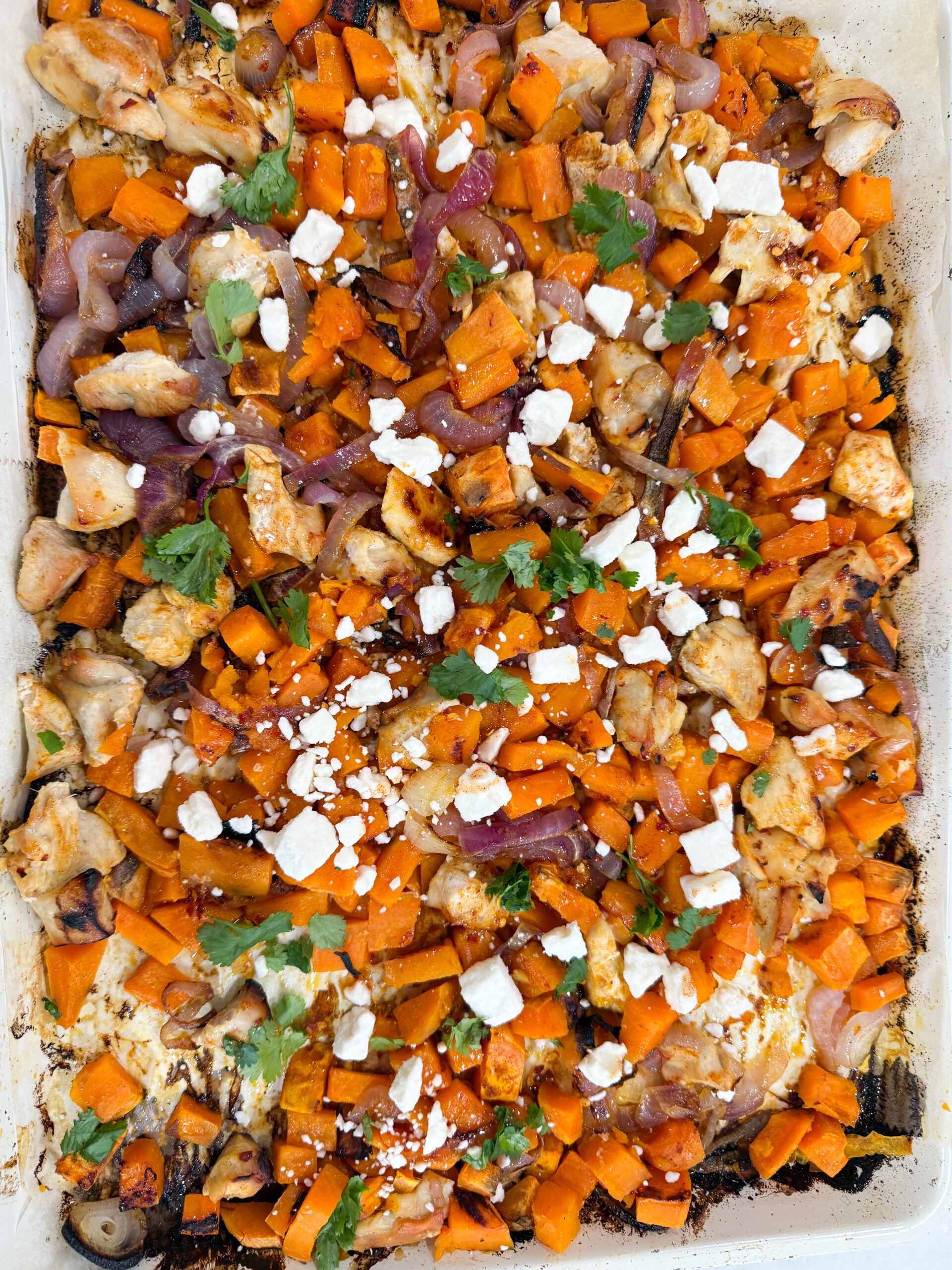 roasted hot honey chicken with sweet potatoes and red onion