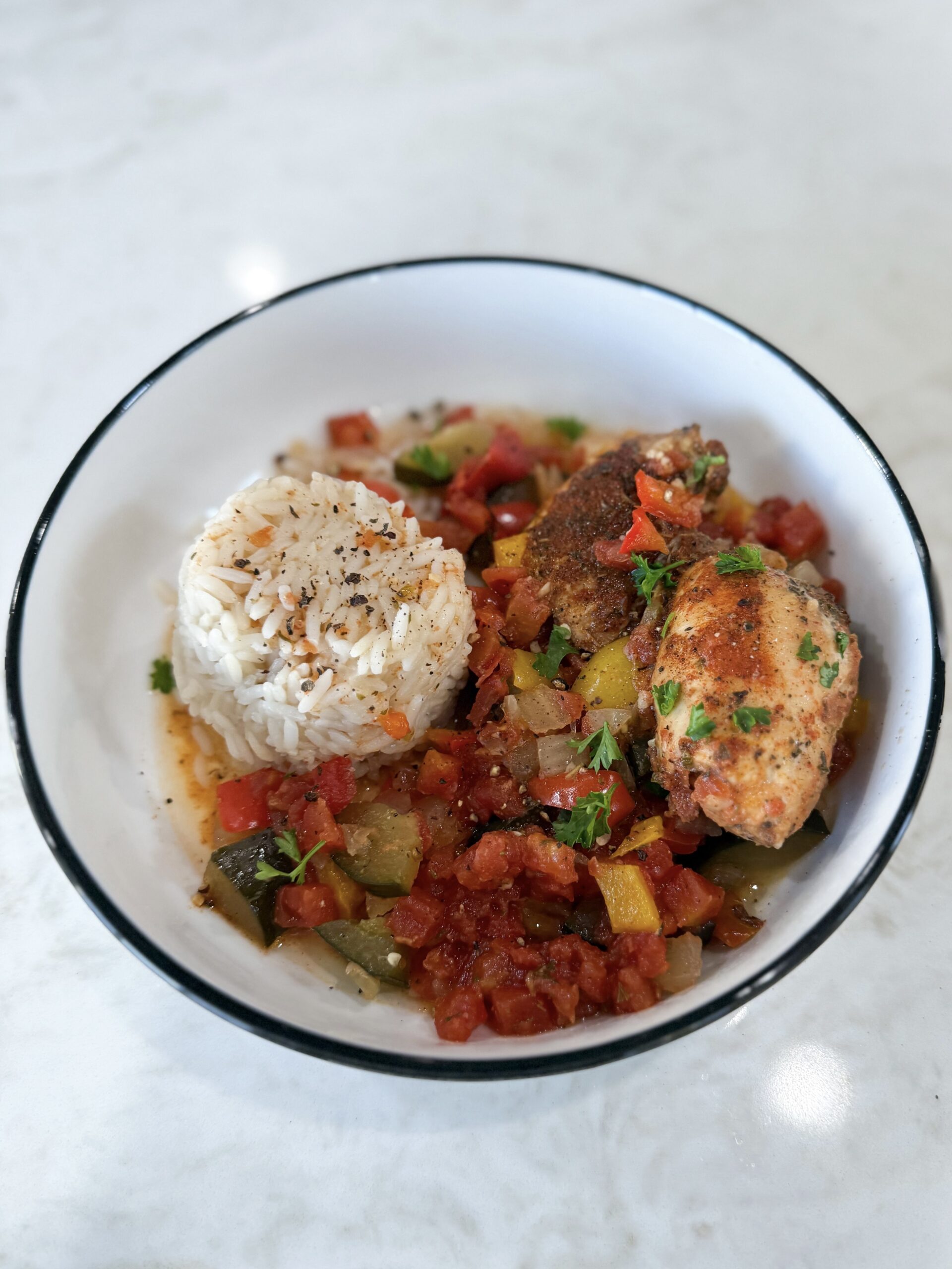chicken and vegetables in a bowl